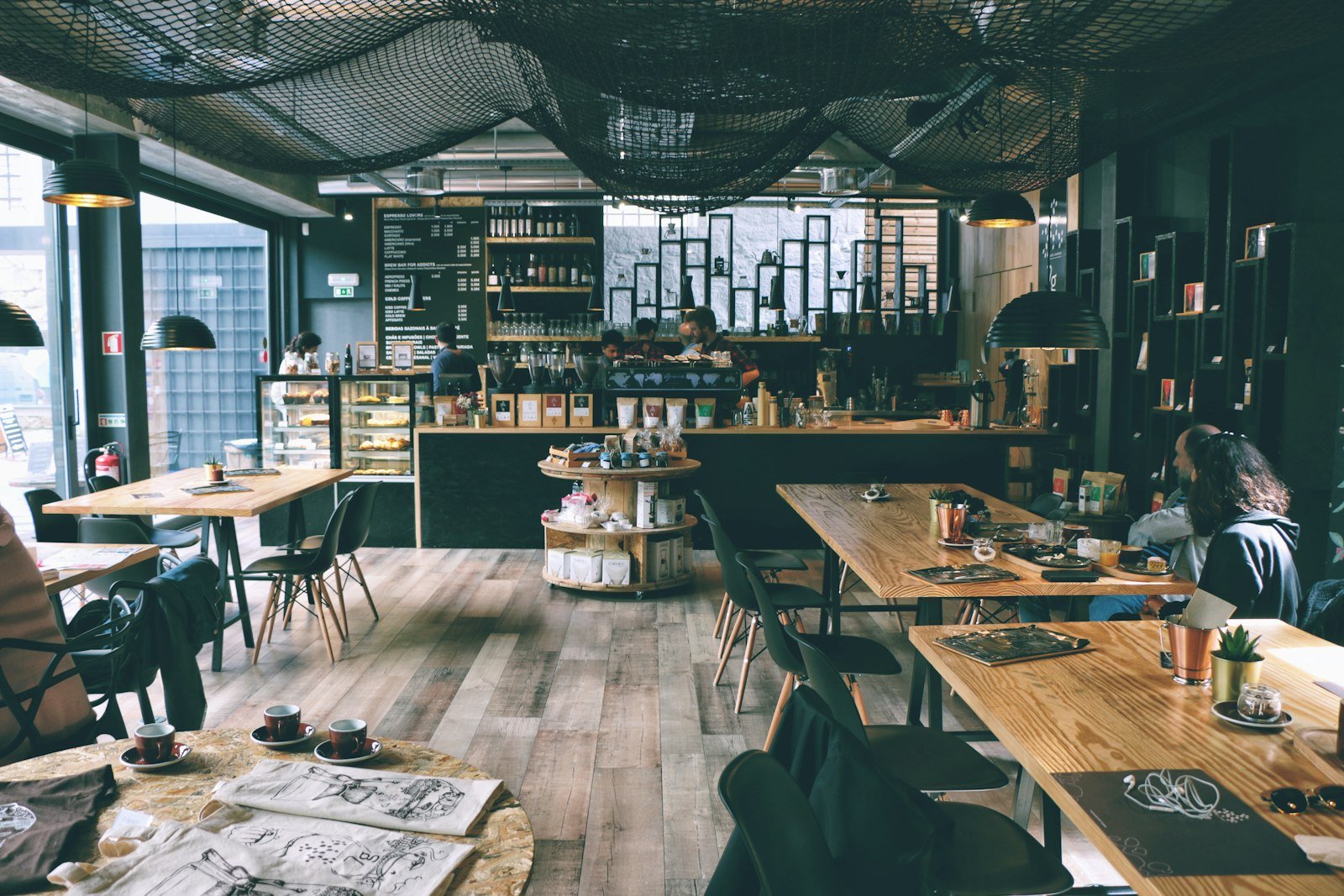 Café owner working behind the counter
