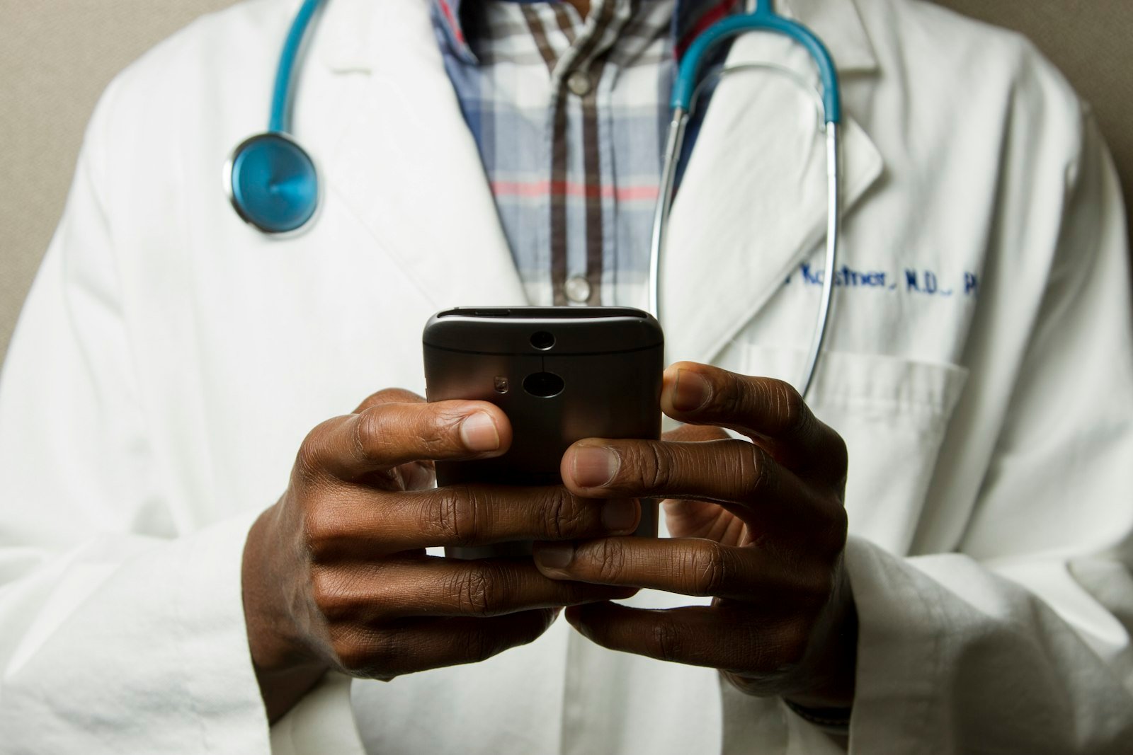 Doctor consulting with a tablet